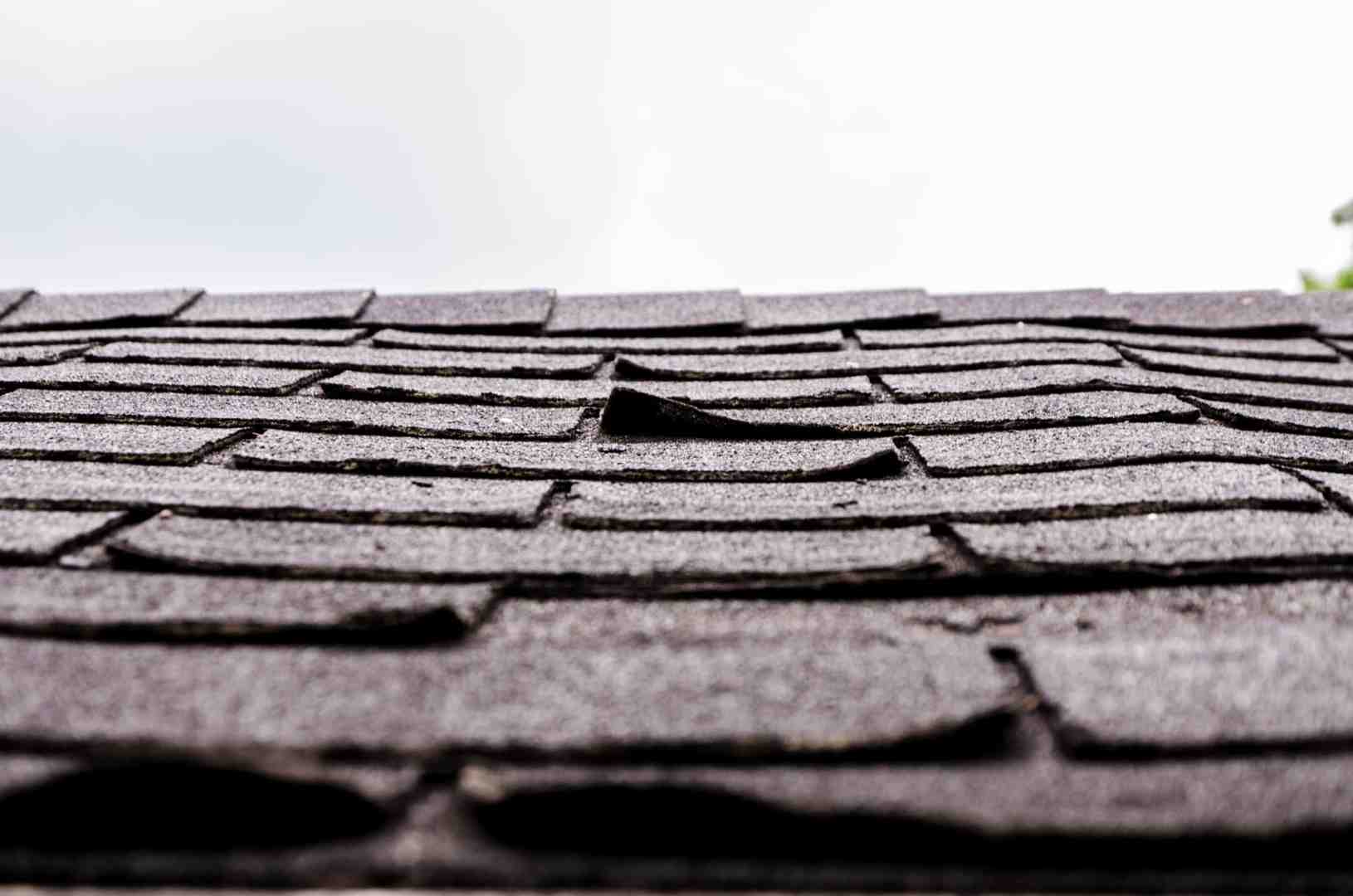 severe hail damage on car and roof