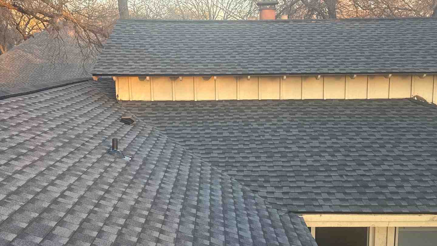 composition-roof-lifespan-from-installation-to-retirement-image composition shingle roof newly installed on modern home - how long does a composition shingle roof last