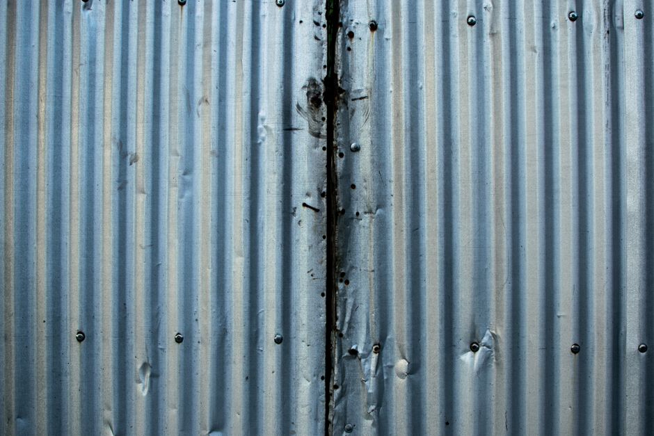 dont-rain-on-my-parade-a-guide-to-fixing-asbestos-roof-leaks-image asbestos roof leak repair corrugated cement sheets weathered