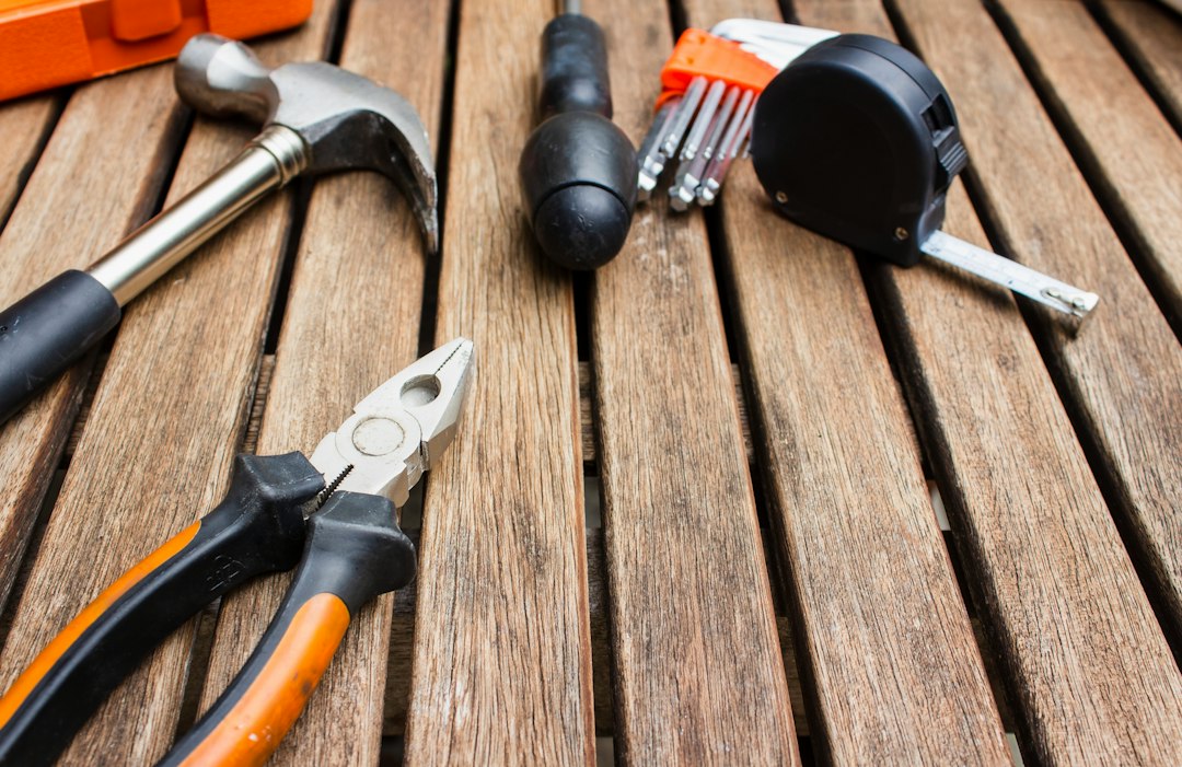 how-to-measure-a-roof-accurately-a-simple-guide-image Roof measuring tools and equipment placed on a work table